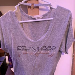 Grey “fearless” v line shirt